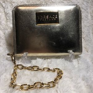 Versace parfums gold wristlet/clutch